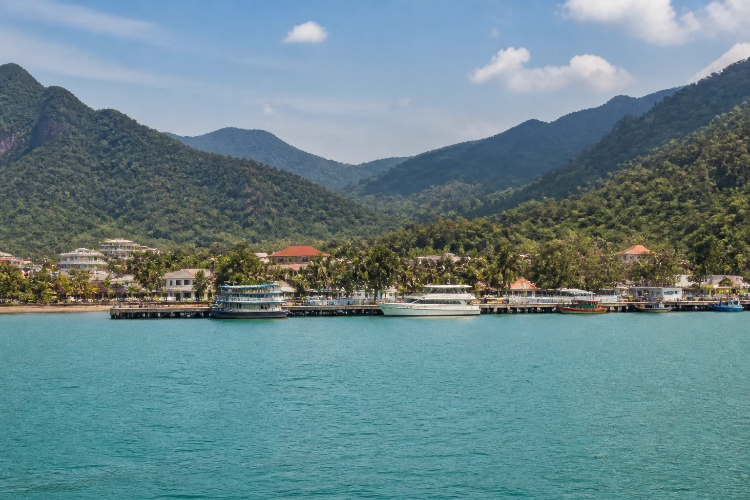 Representative cruise port destination view: Ko Kood, Thailand; passenger waterfront and harbor water, not an exact landmark photograph.