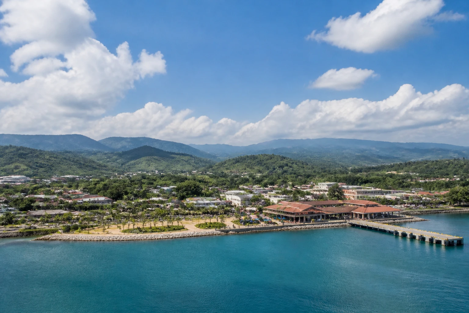 Representative cruise port destination view: Amber Cove, Dominican Republic; passenger waterfront and harbor water, not an exact landmark photograph.