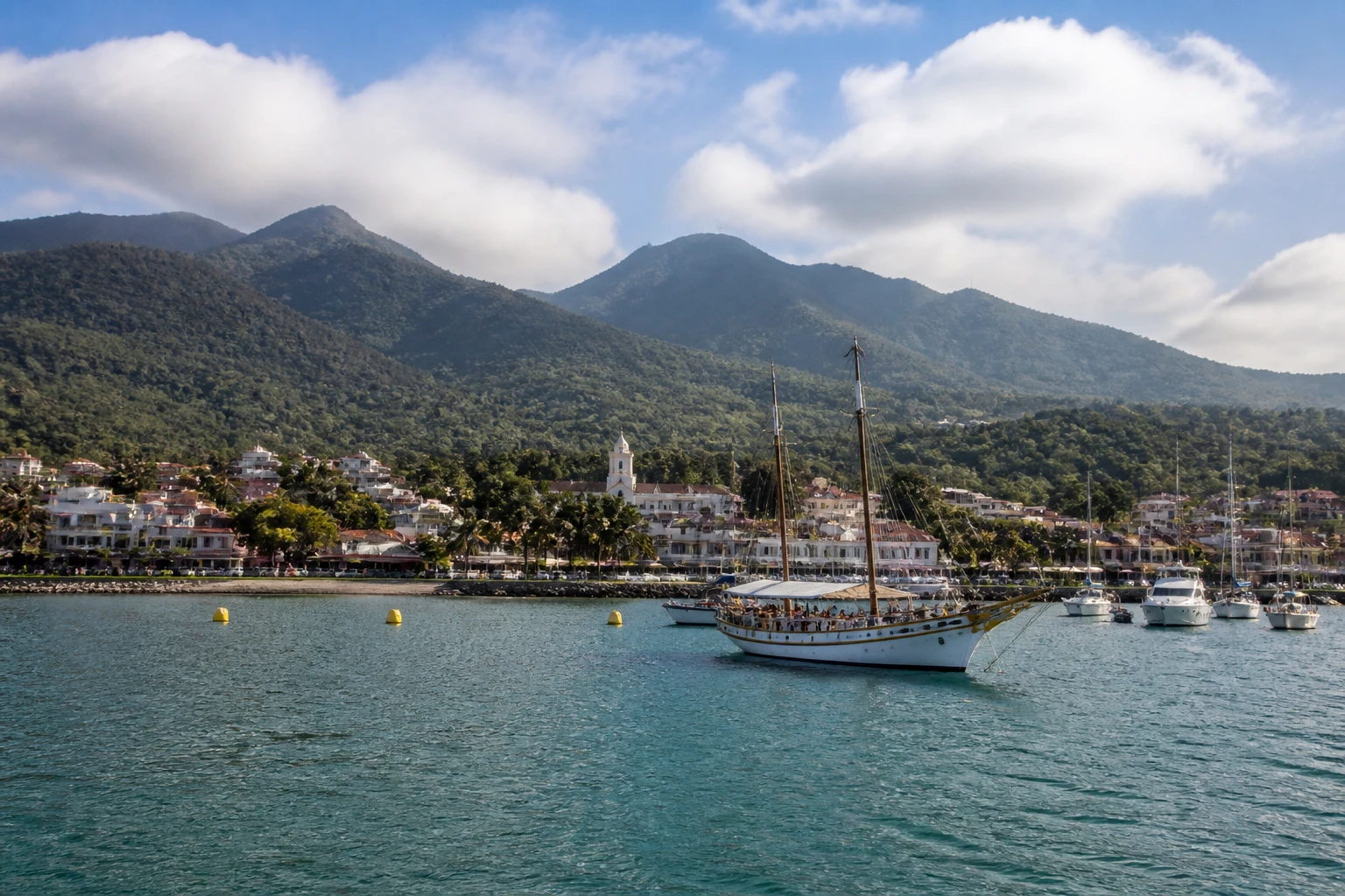Representative cruise port destination view: Ilhabela, Brazil; passenger waterfront and harbor water, not an exact landmark photograph.