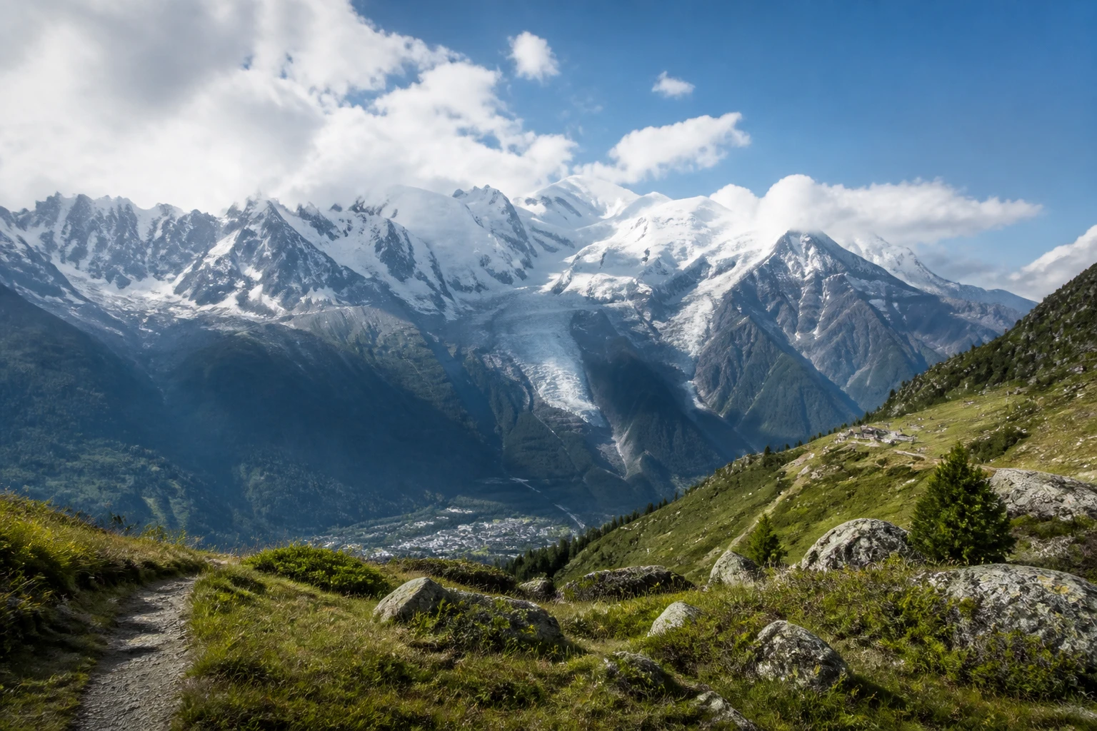 Representative mountain destination view: Chamonix and Mont Blanc, France; mountain or canyon terrain and regional vegetation, not an exact landmark photograph.