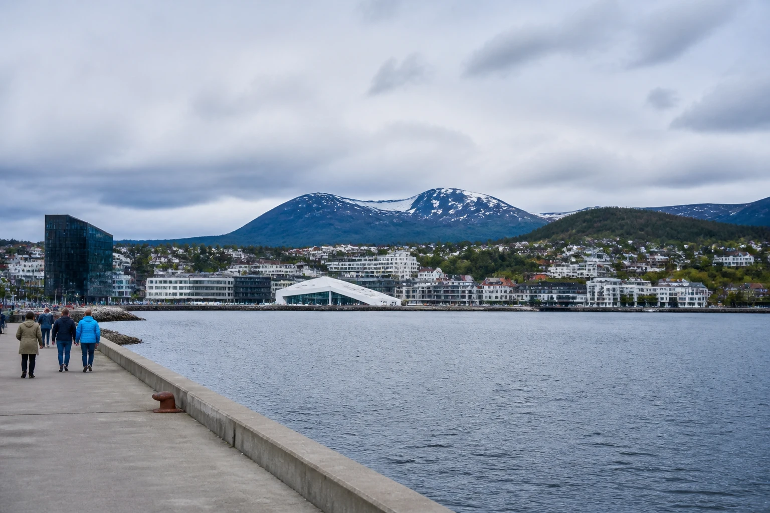 Representative cruise port destination view: Molde, Norway; passenger waterfront and harbor water, not an exact landmark photograph.