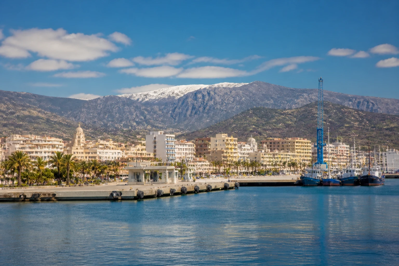 Representative cruise port destination view: Motril, Spain; passenger waterfront and harbor water, not an exact landmark photograph.