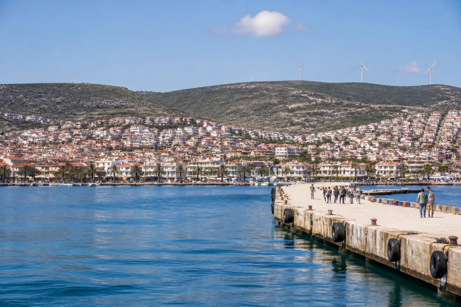 Representative cruise port destination view: Cesme, Turkiye; passenger waterfront and harbor water, not an exact landmark photograph.