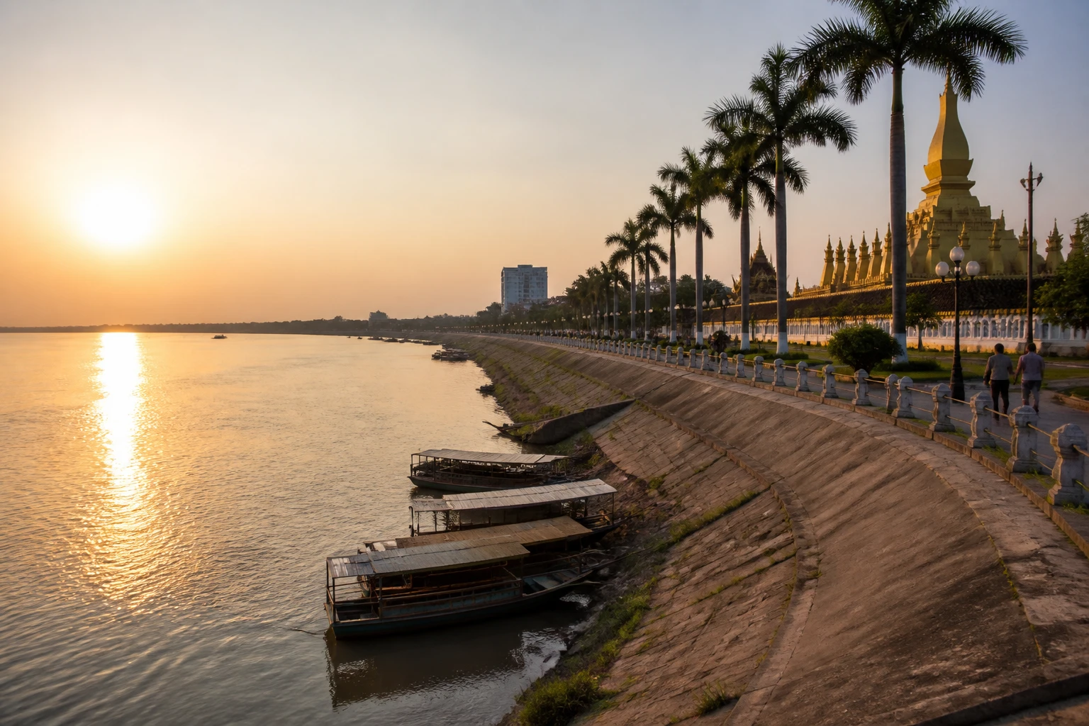 Representative river destination view: Vientiane, Laos; inland water, regional terrain, and vegetation, not an exact landmark photograph.
