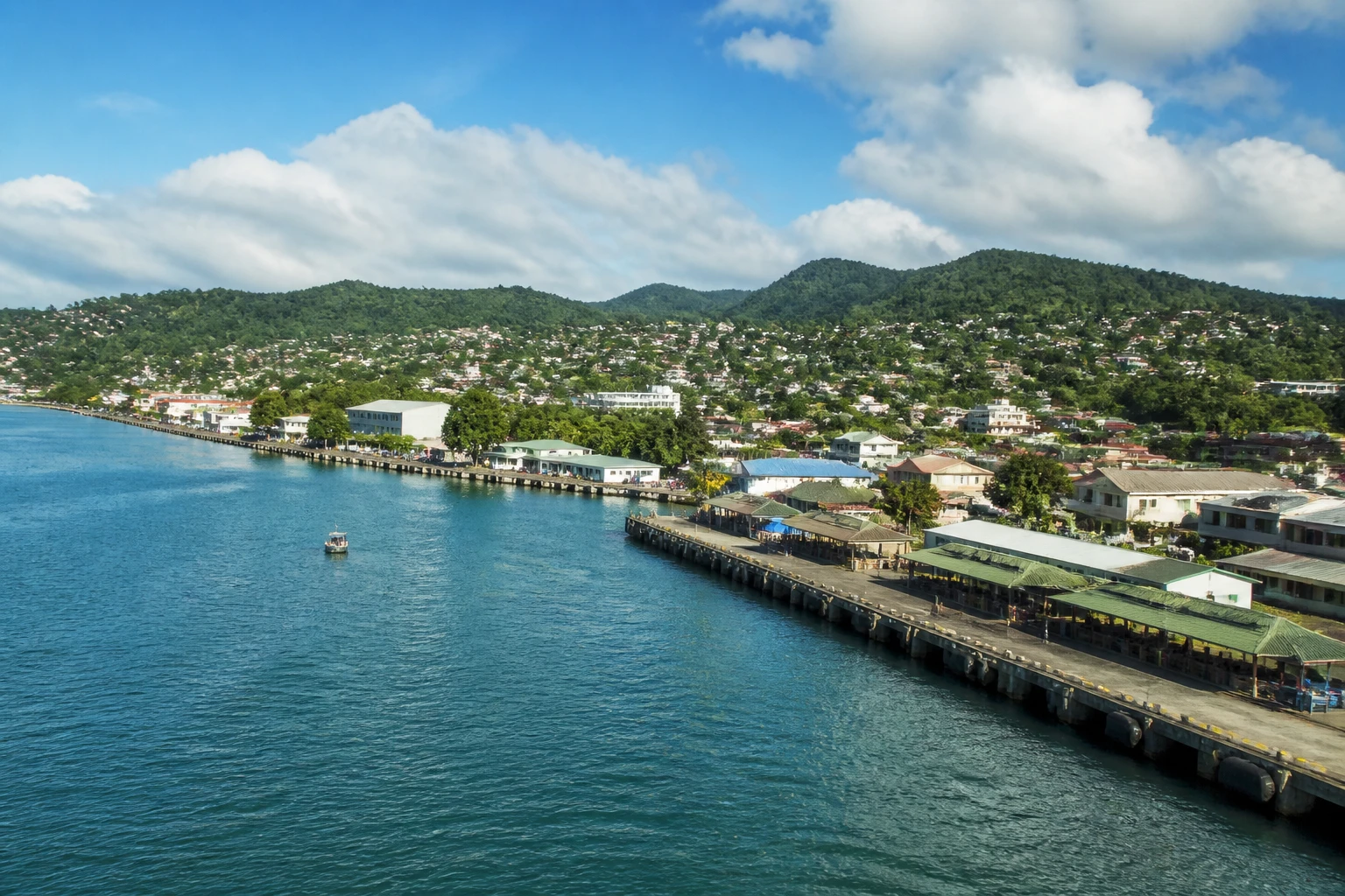 Representative cruise port destination view: Scarborough, Trinidad and Tobago; passenger waterfront and harbor water, not an exact landmark photograph.