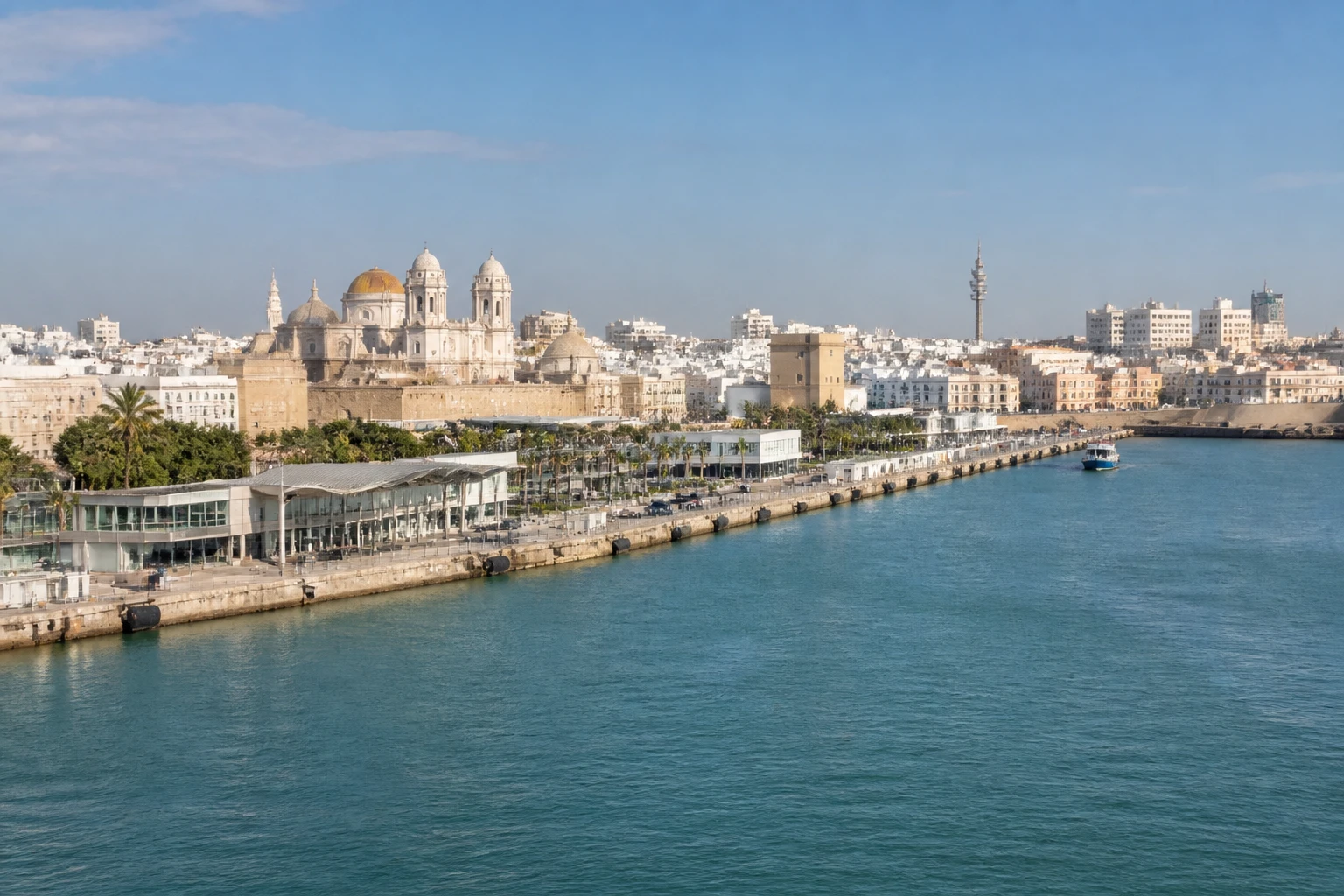 Representative cruise port destination view: Cadiz, Spain; passenger waterfront and harbor water, not an exact landmark photograph.