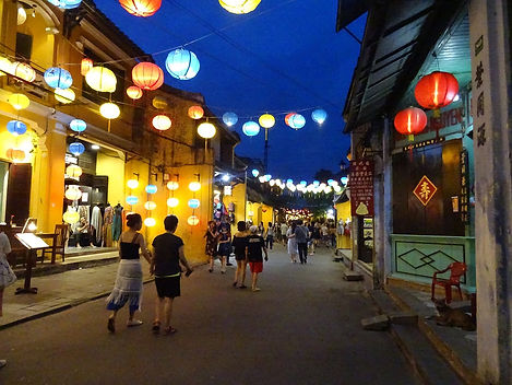 colorful lanterns illuminating Hoi An's historic streets in Vietnam, a destination or experience featured on the Alluring Vietnam and the Temples of Angkor with Bangkok tour