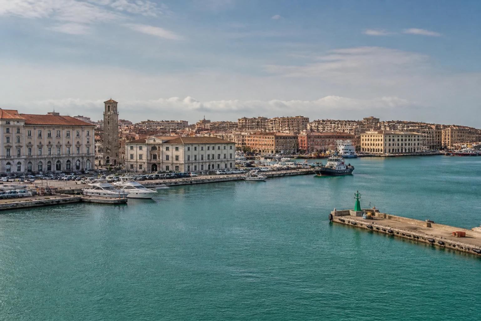 Representative cruise port destination view: Livorno, Italy; passenger waterfront and harbor water, not an exact landmark photograph.
