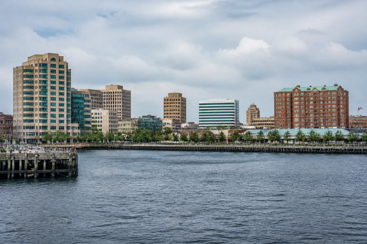 Representative cruise port destination view: Norfolk, United States; passenger waterfront and harbor water, not an exact landmark photograph.
