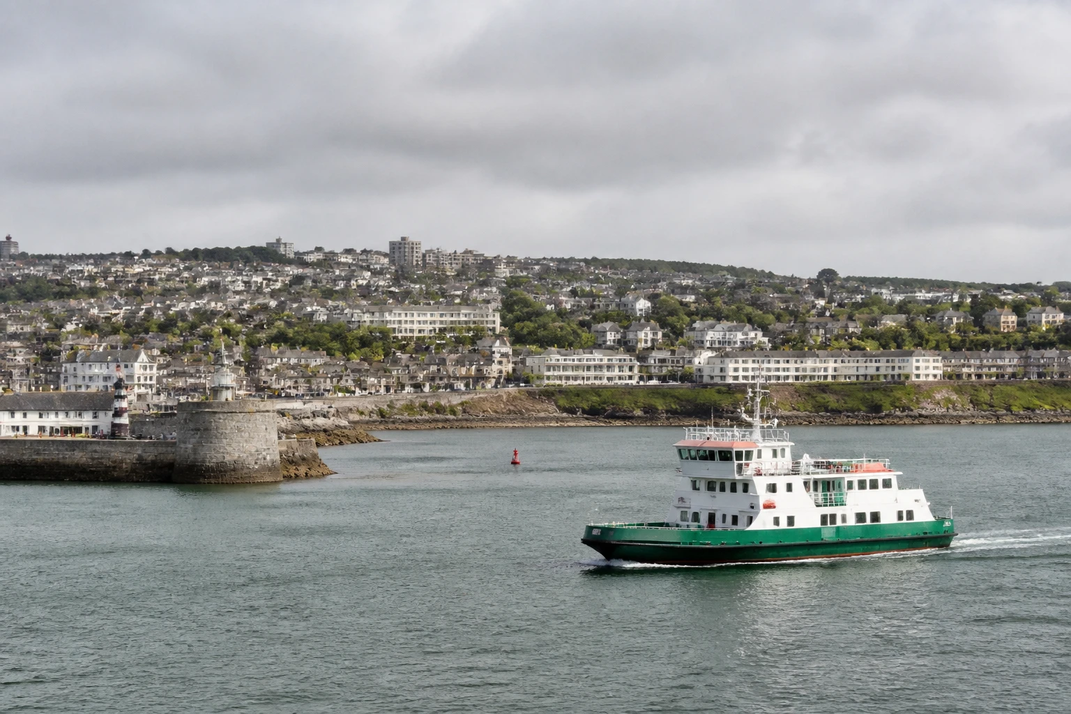 Representative cruise port destination view: Plymouth, United Kingdom; passenger waterfront and harbor water, not an exact landmark photograph.
