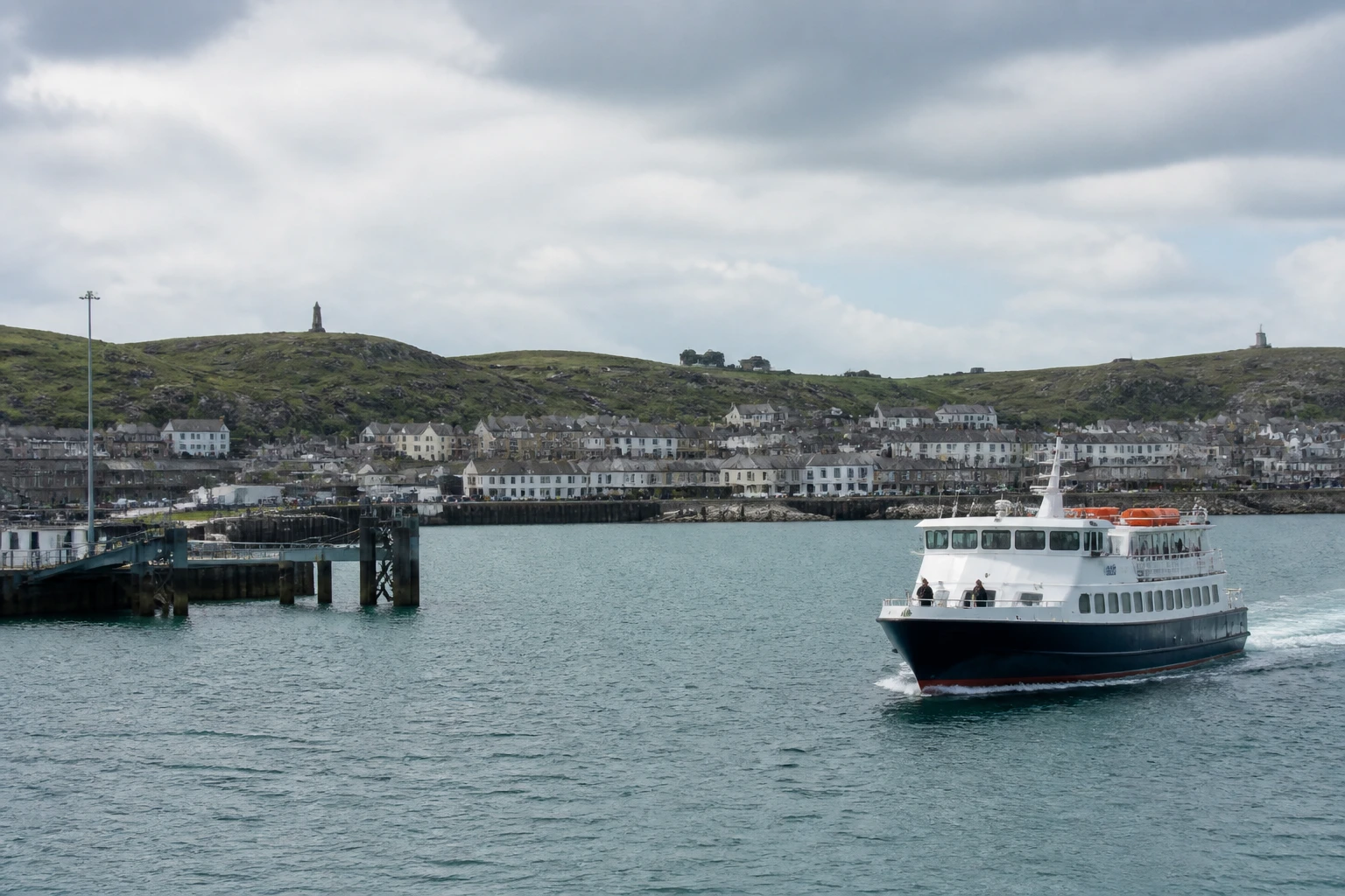 Representative cruise port destination view: Holyhead, United Kingdom; passenger waterfront and harbor water, not an exact landmark photograph.