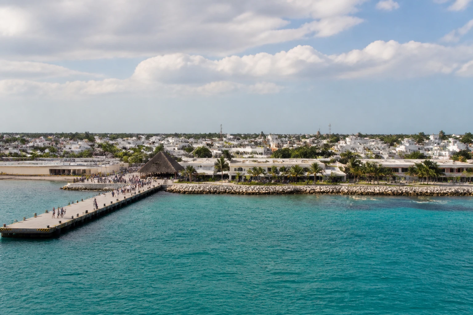 Representative cruise port destination view: Progreso, Mexico; passenger waterfront and harbor water, not an exact landmark photograph.