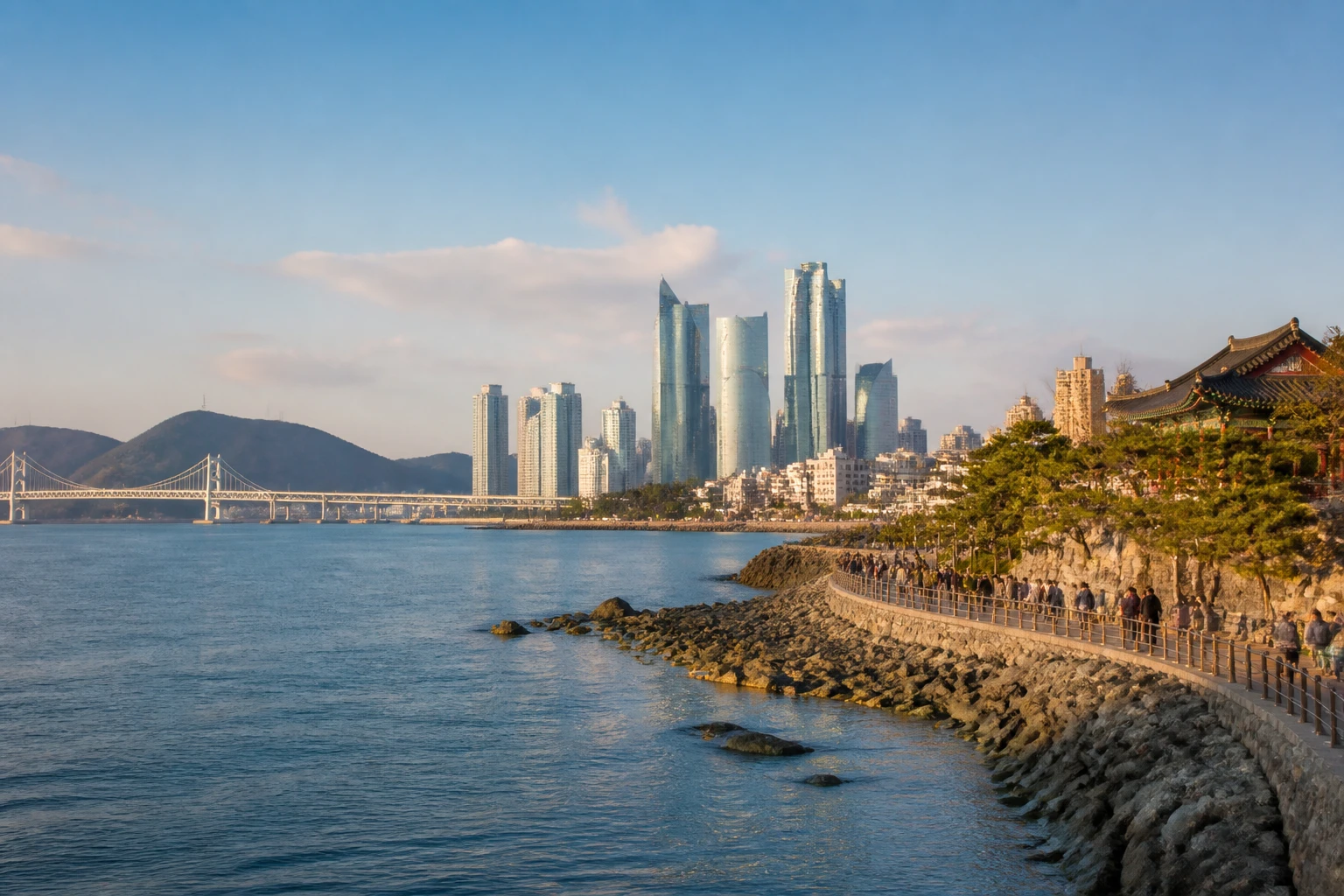 Representative city destination view: Busan, South Korea; passenger waterfront and harbor water, not an exact landmark photograph.