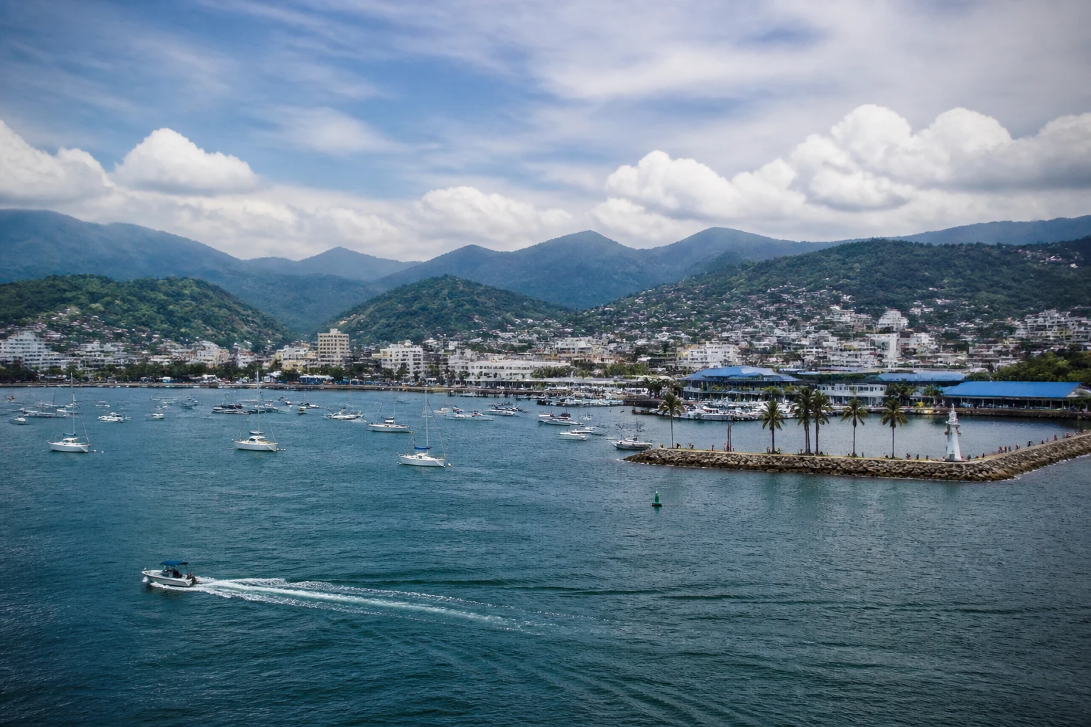 Representative cruise port destination view: Angra Dos Reis, Brazil; passenger waterfront and harbor water, not an exact landmark photograph.