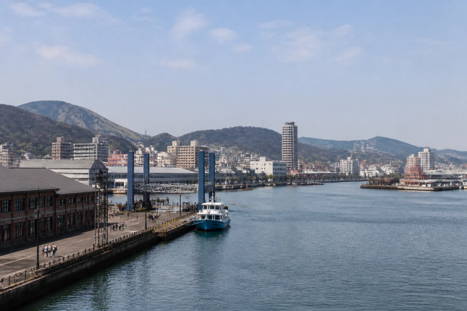 Representative cruise port destination view: Kitakyushu, Japan; passenger waterfront and harbor water, not an exact landmark photograph.
