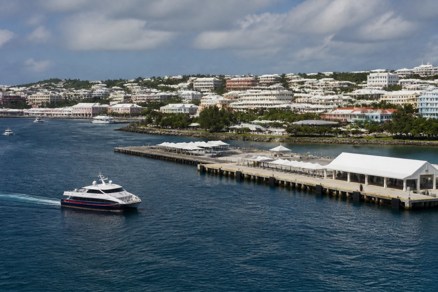 Representative cruise port destination view: King's Wharf, Bermuda; passenger waterfront and harbor water, not an exact landmark photograph.