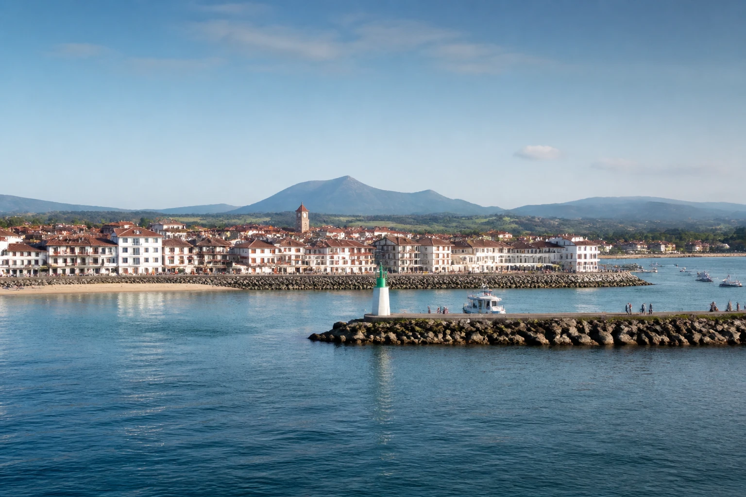 Representative cruise port destination view: St. Jean de Luz, France; passenger waterfront and harbor water, not an exact landmark photograph.