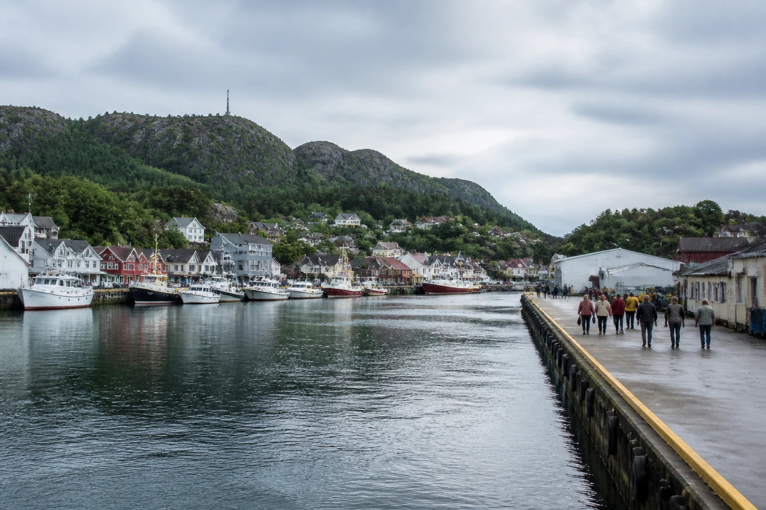 Representative cruise port destination view: Farsund, Norway; passenger waterfront and harbor water, not an exact landmark photograph.