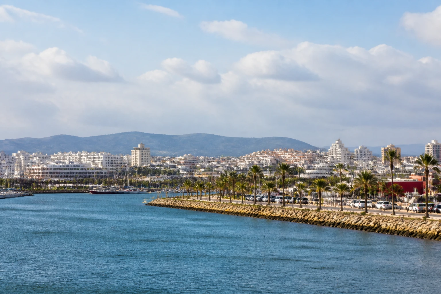 Representative cruise port destination view: Portimao, Portugal; passenger waterfront and harbor water, not an exact landmark photograph.