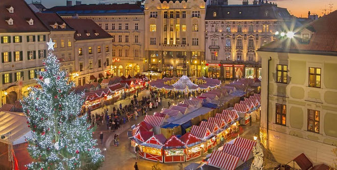 Market stalls, festive lights and local architecture in Bratislava, Slovakia.