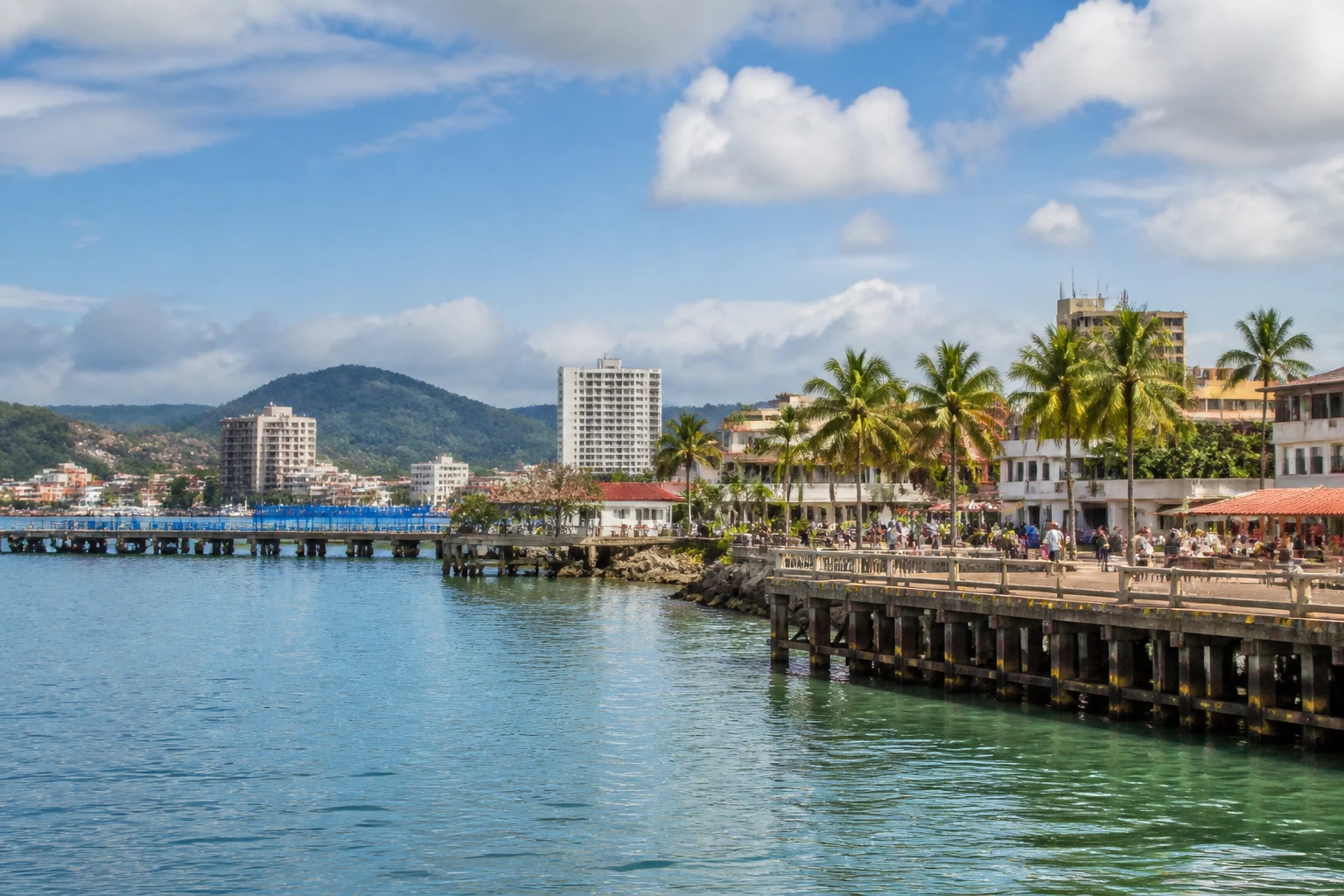 Representative cruise port destination view: Colon, Panama; passenger waterfront and harbor water, not an exact landmark photograph.