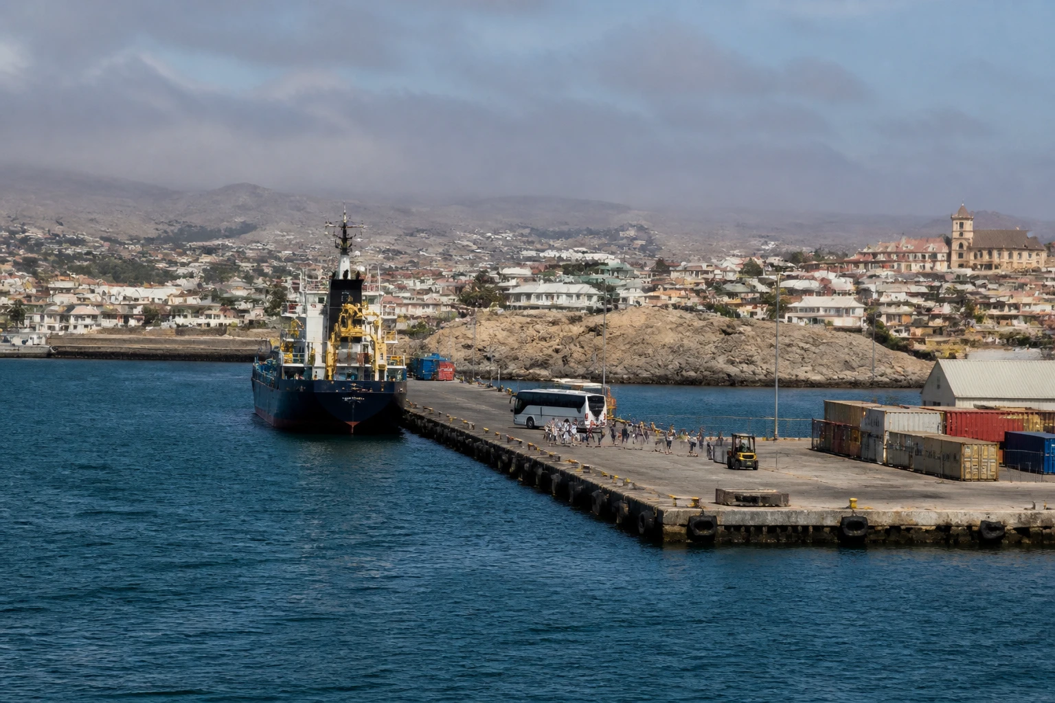 Representative cruise port destination view: Luderitz, Namibia; passenger waterfront and harbor water, not an exact landmark photograph.