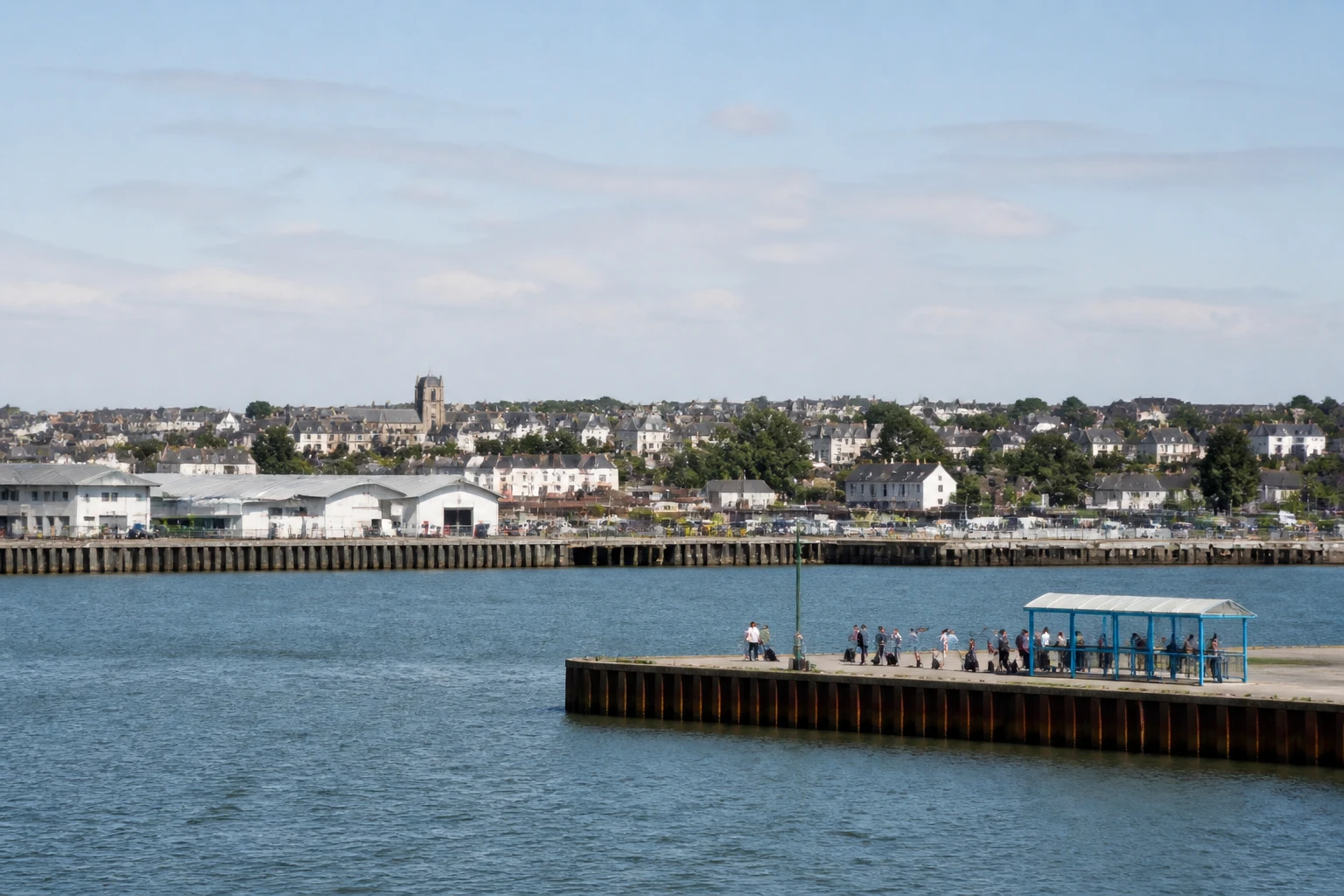 Representative cruise port destination view: Montoir de Bretagne, France; passenger waterfront and harbor water, not an exact landmark photograph.