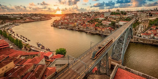 Aerial view of the Dom Luis I Bridge spanning the Douro River between Porto and Vila Nova de Gaia, Portugal.