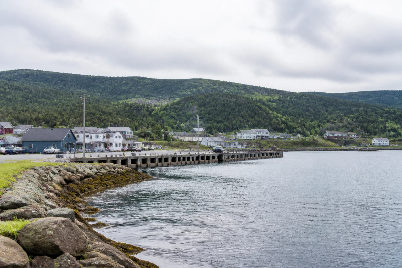 Representative cruise port destination view: Red Bay, Canada; passenger waterfront and harbor water, not an exact landmark photograph.