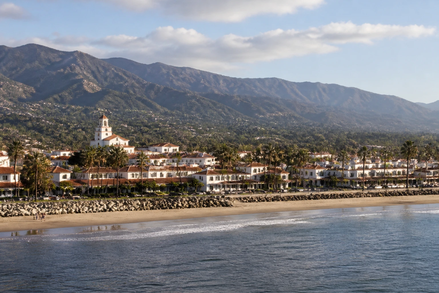 Representative coastal destination view: Santa Barbara, United States; coastline and regional vegetation, not an exact landmark photograph.