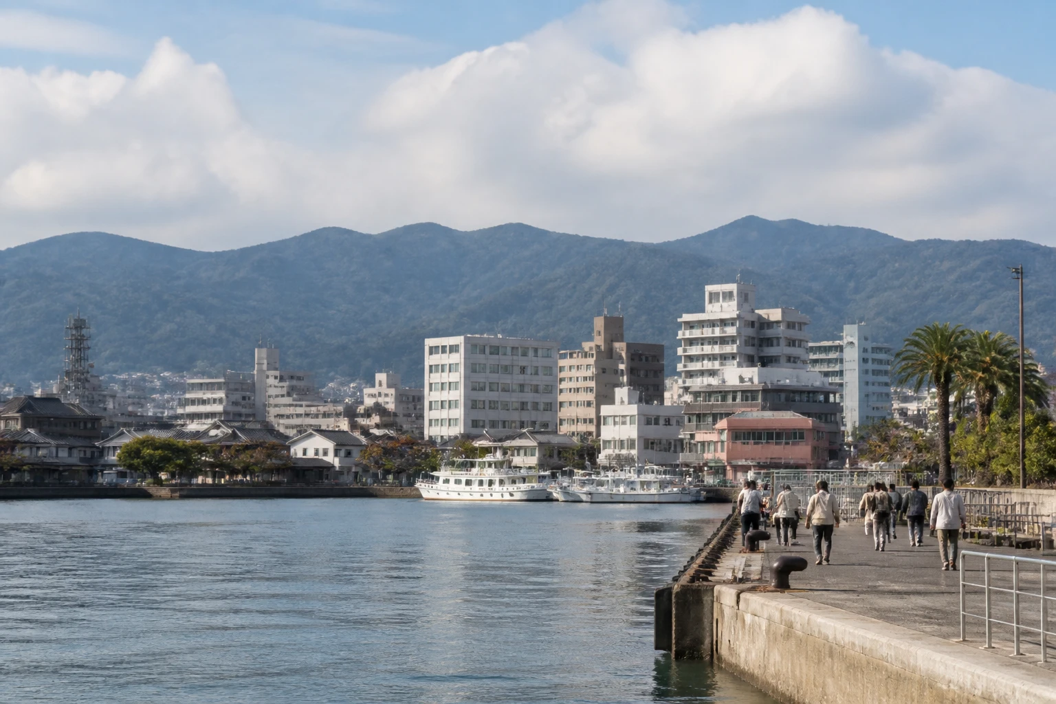 Representative cruise port destination view: Yatsushiro, Japan; passenger waterfront and harbor water, not an exact landmark photograph.