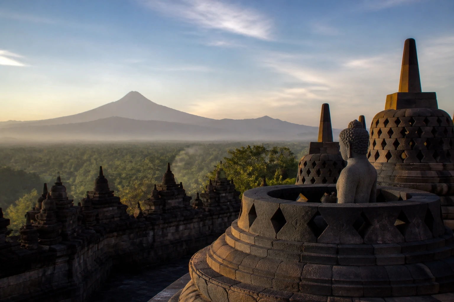 Representative travel destination overview of Yogyakarta and Borobudur in Indonesia, showing heritage-scale streetscape, regional architecture, and natural light rather than an exact landmark view.