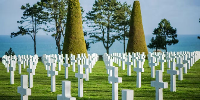 Coastal cliffs, shoreline and historic landscape at Normandy Beaches -US.
