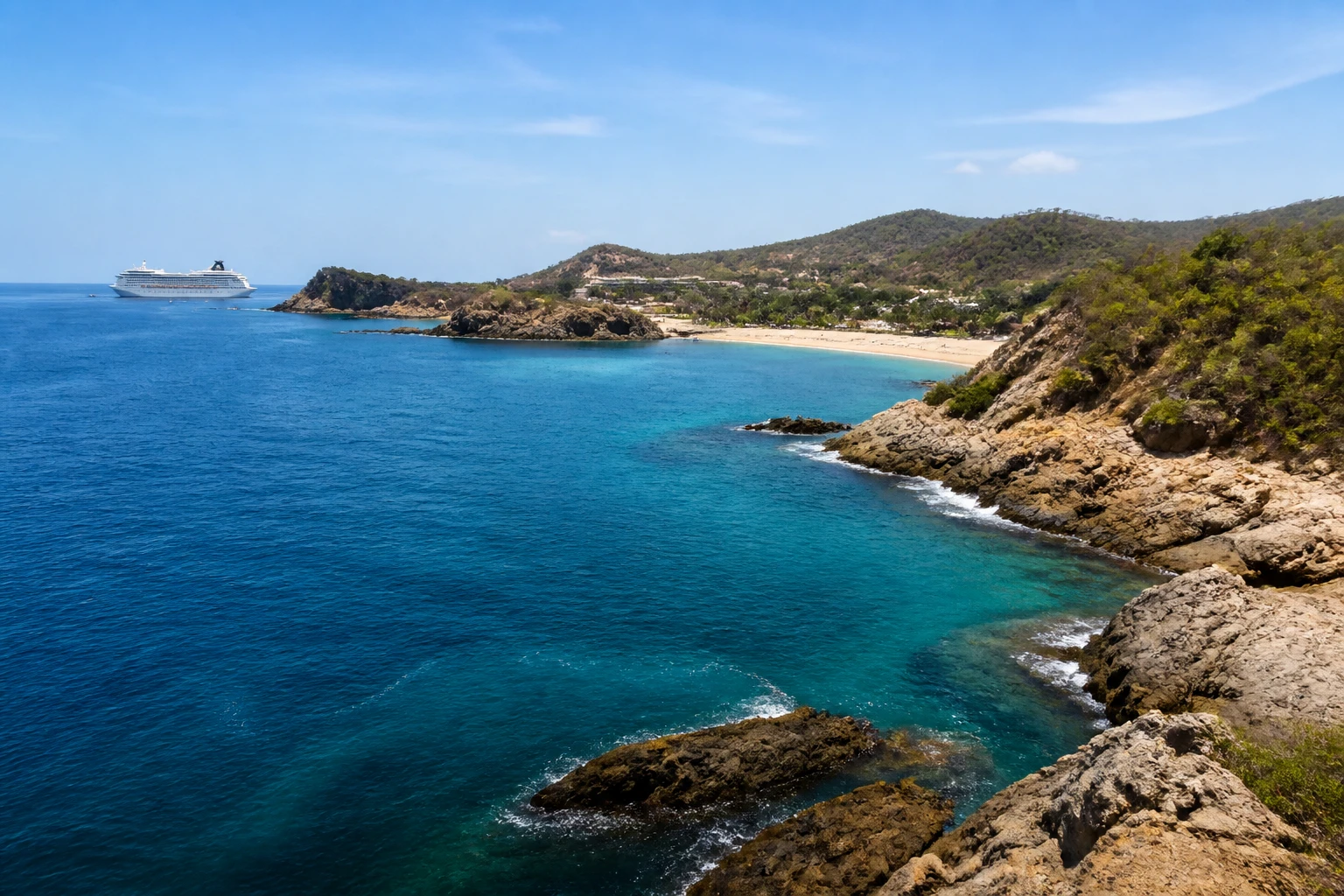 Representative coastal destination view: Huatulco, Mexico; coastline and regional vegetation, not an exact landmark photograph.