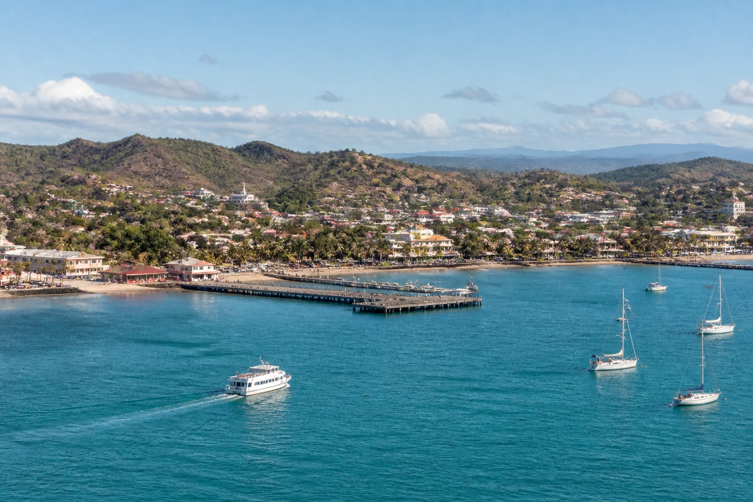 Representative cruise port destination view: San Juan del Sur, Nicaragua; passenger waterfront and harbor water, not an exact landmark photograph.