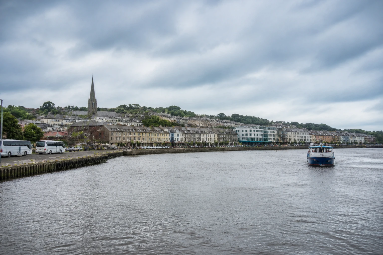 Representative cruise port destination view: Waterford, Ireland; passenger waterfront and harbor water, not an exact landmark photograph.