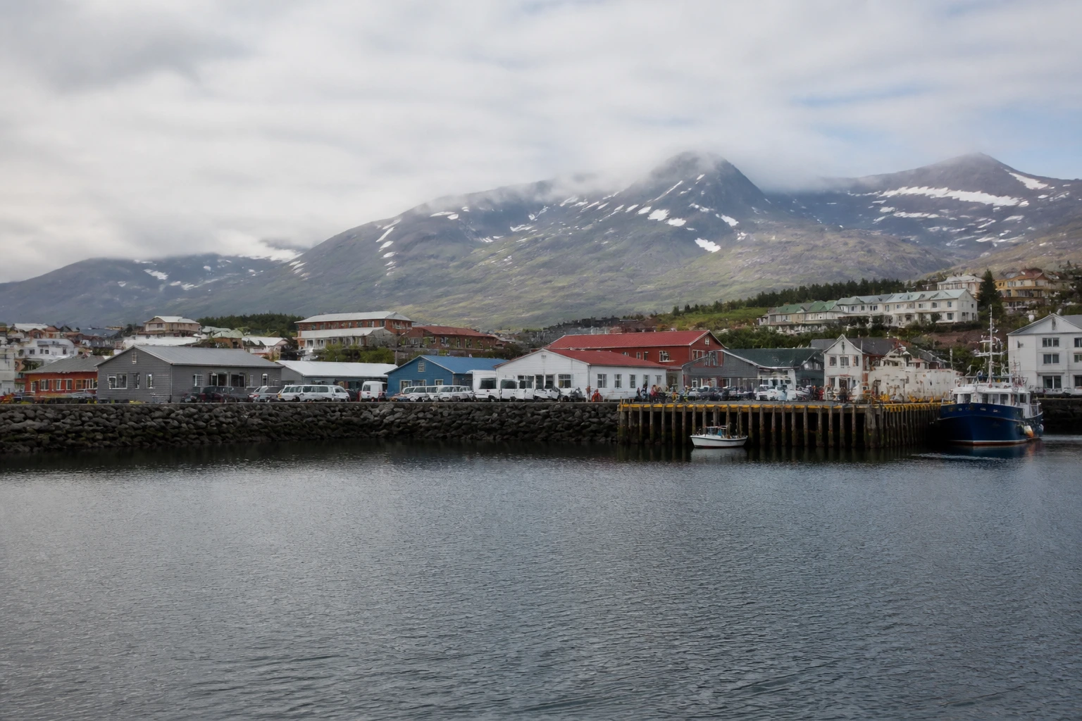 Representative cruise port destination view: Djupivogur, Iceland; passenger waterfront and harbor water, not an exact landmark photograph.