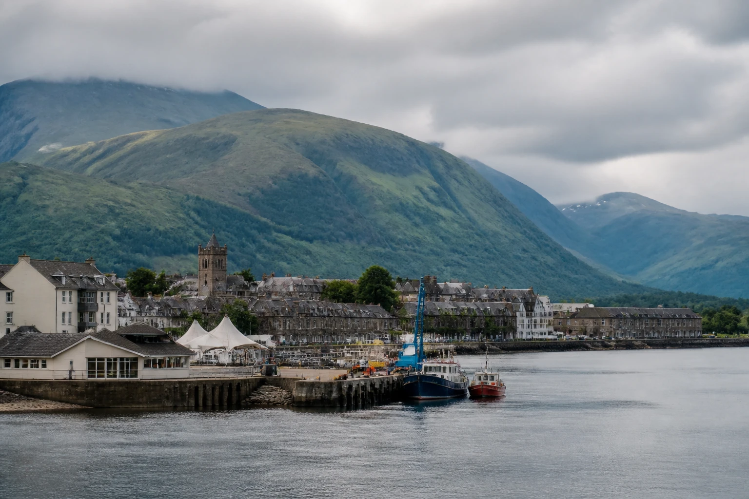 Representative cruise port destination view: Fort William, United Kingdom; passenger waterfront and harbor water, not an exact landmark photograph.