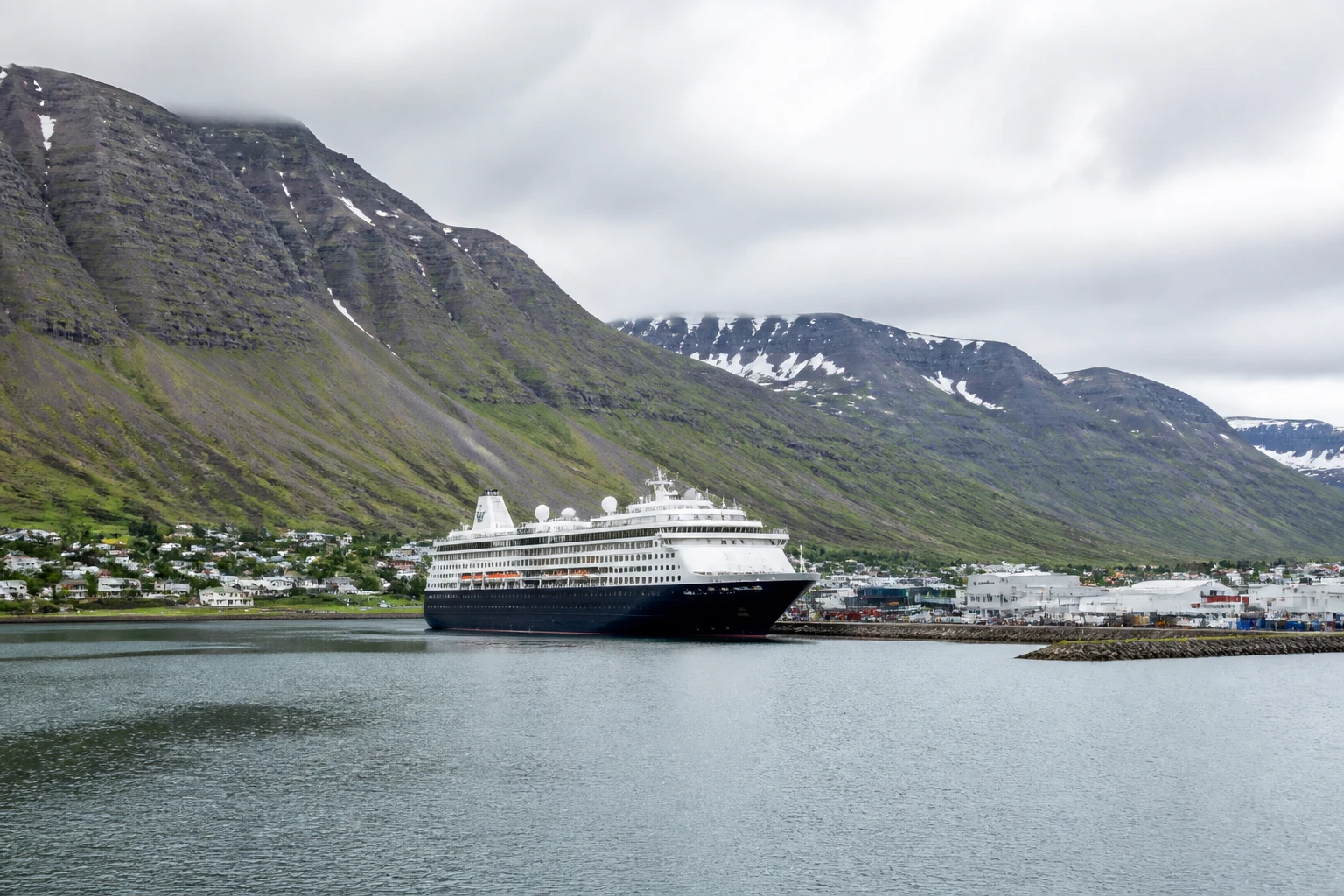 Representative cruise port destination view: Isafjordur, Iceland; passenger waterfront and harbor water, not an exact landmark photograph.