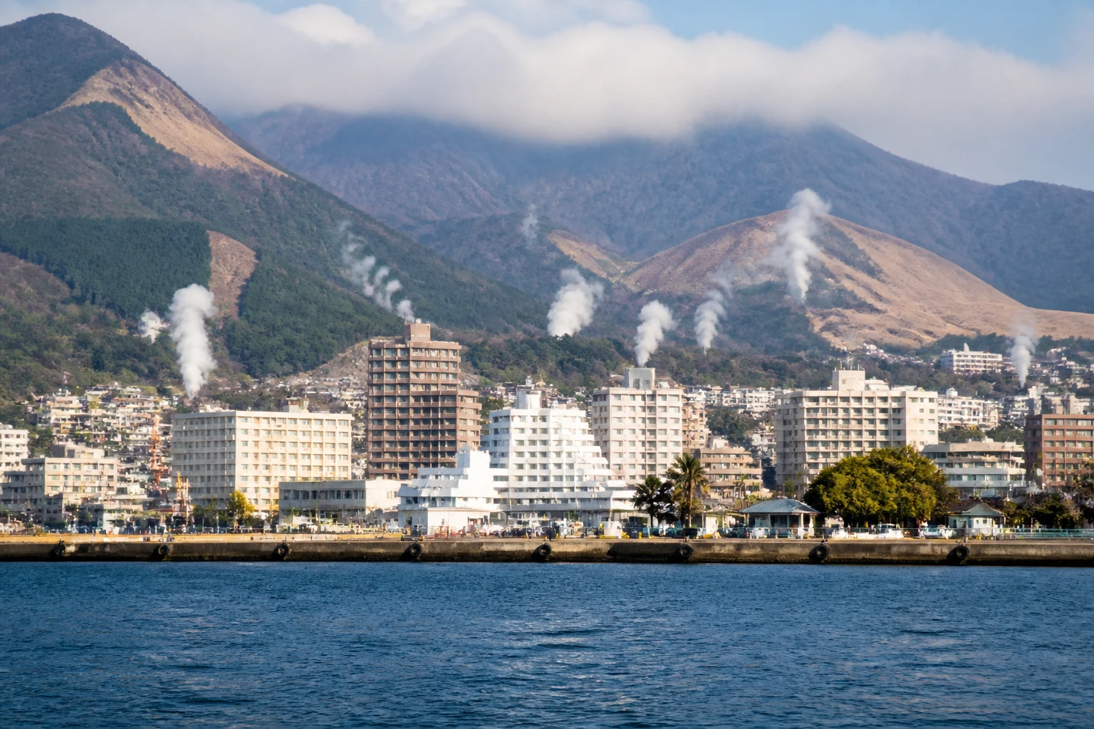 Representative cruise port destination view: Beppu, Japan; passenger waterfront and harbor water, not an exact landmark photograph.