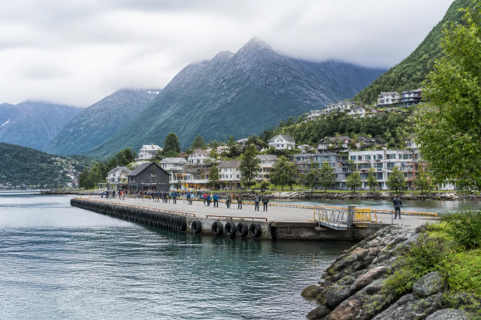 Representative cruise port destination view: Åndalsnes, Norway; passenger waterfront and harbor water, not an exact landmark photograph.