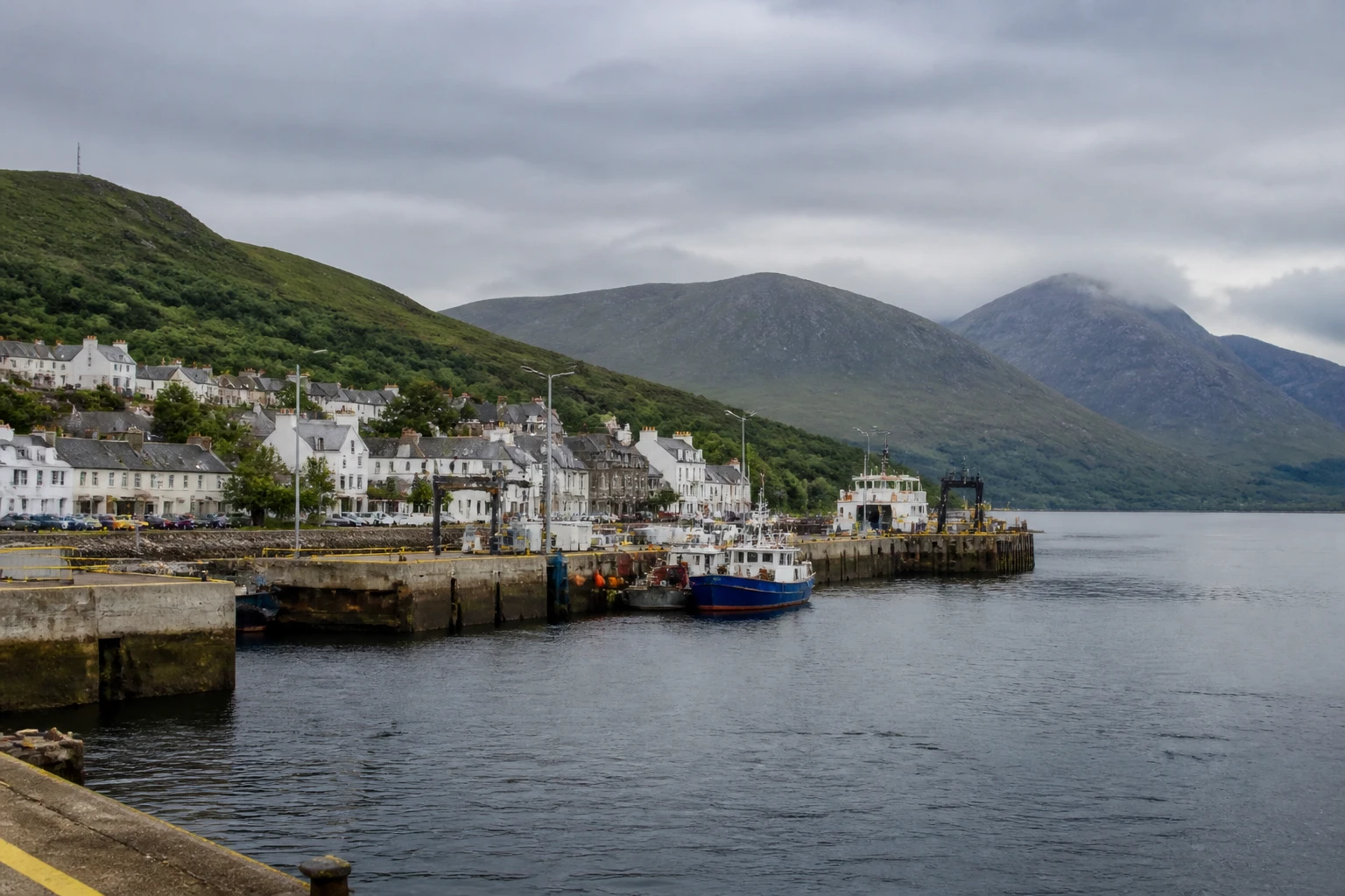 Representative cruise port destination view: Ullapool, United Kingdom; passenger waterfront and harbor water, not an exact landmark photograph.