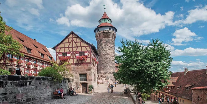 Historic church towers and surrounding architecture in Nuremberg.