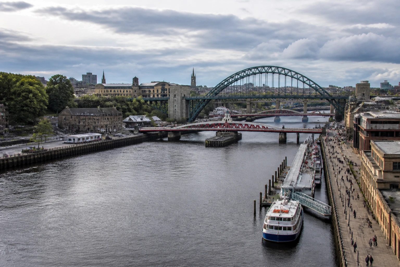Representative cruise port destination view: Newcastle upon Tyne, United Kingdom; passenger waterfront and harbor water, not an exact landmark photograph.