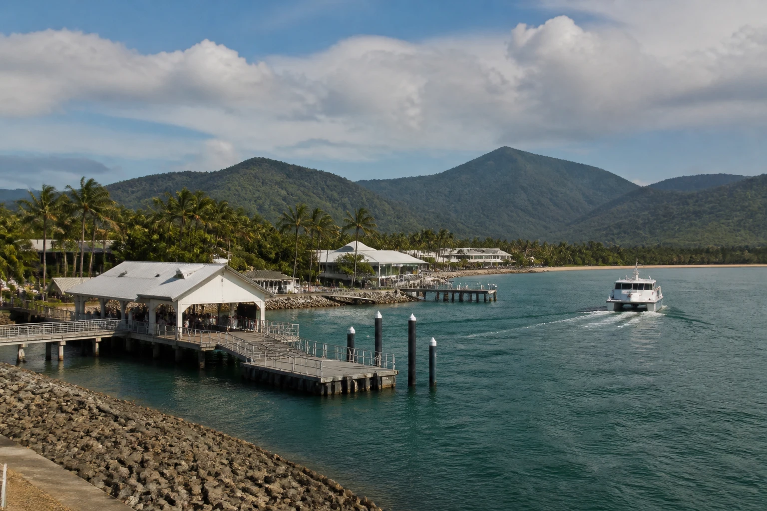Representative cruise port destination view: Port Douglas, Australia; passenger waterfront and harbor water, not an exact landmark photograph.