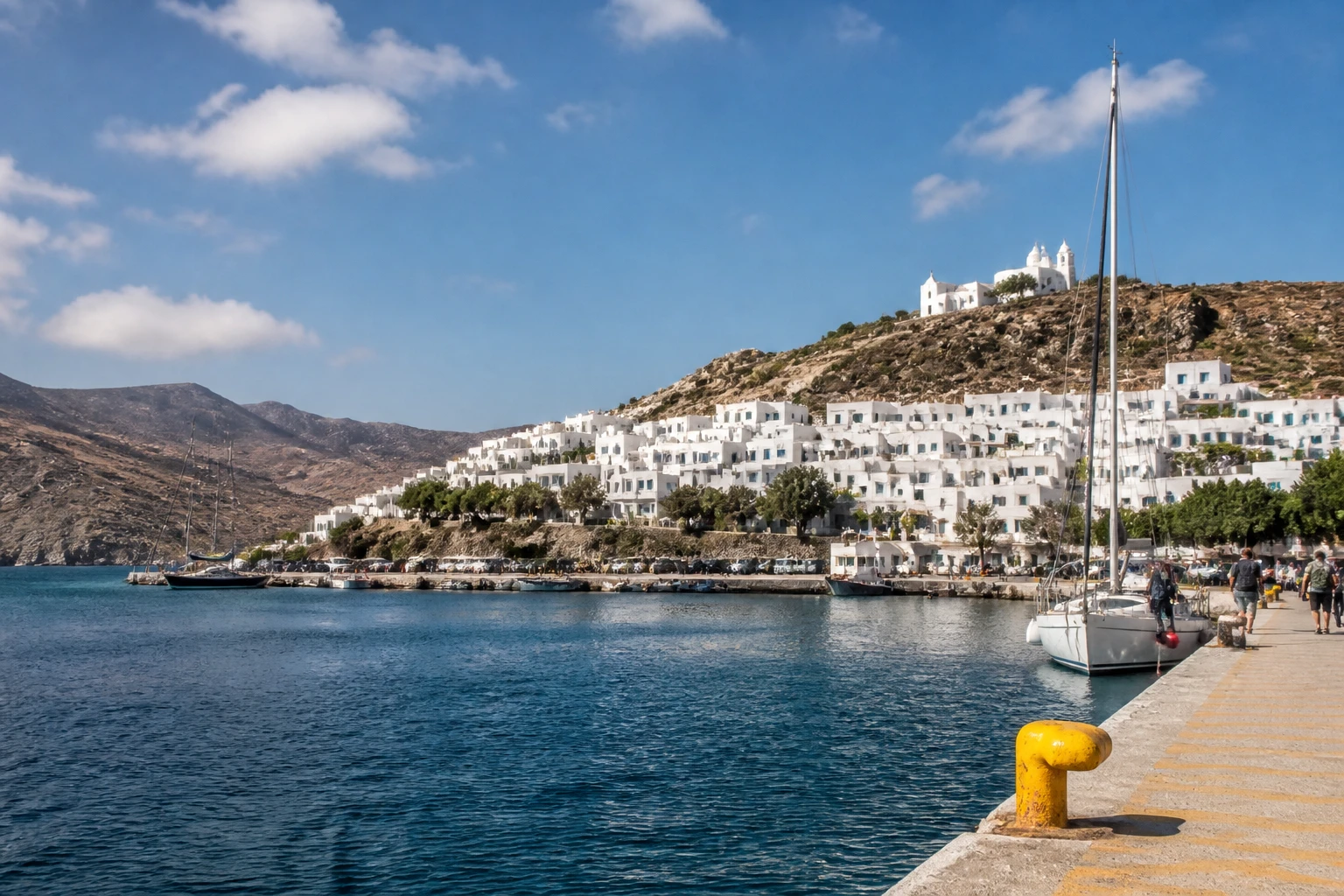 Representative cruise port destination view: Amorgos, Greece; passenger waterfront and harbor water, not an exact landmark photograph.