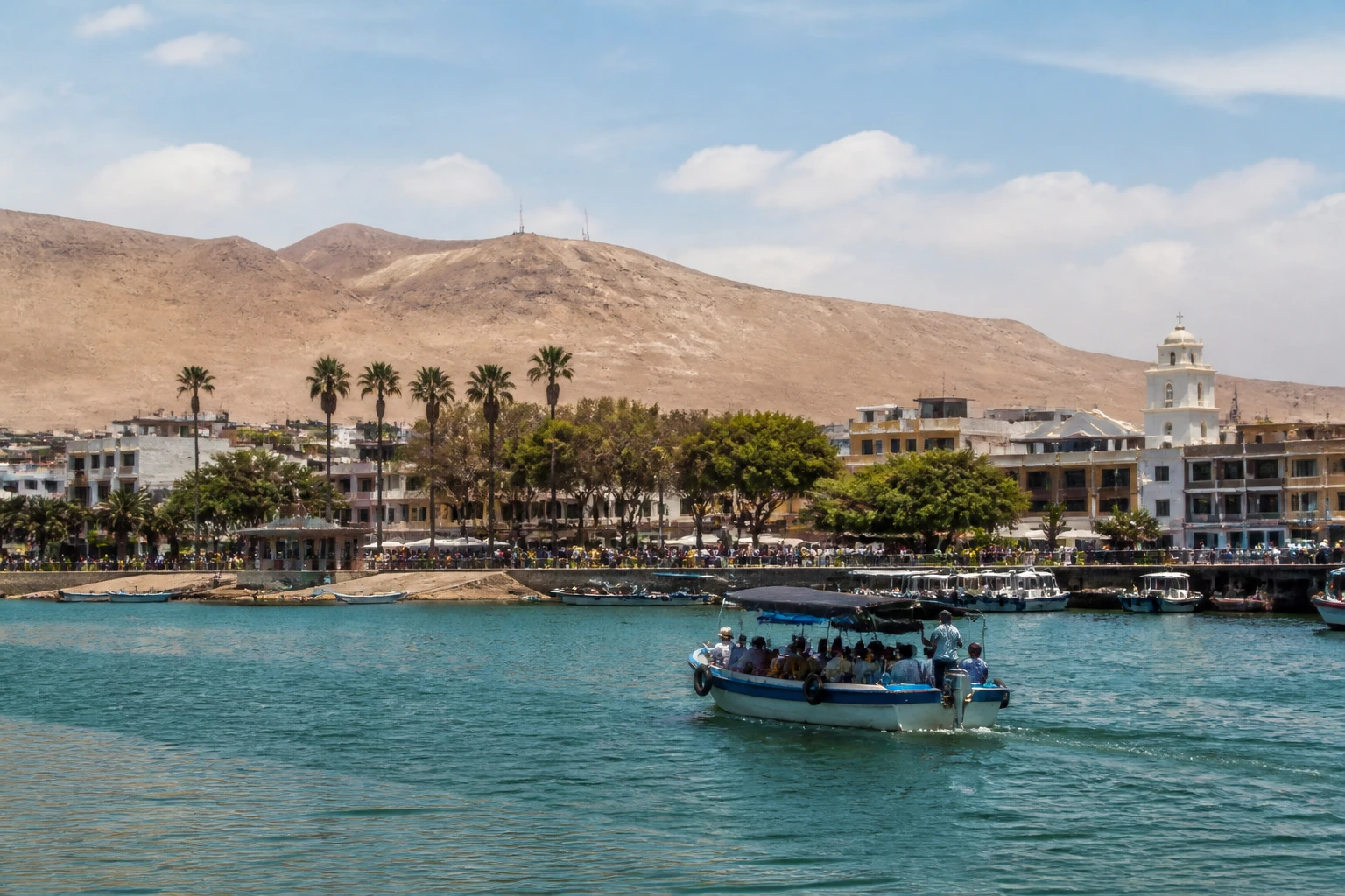 Representative cruise port destination view: Pisco, Peru; passenger waterfront and harbor water, not an exact landmark photograph.