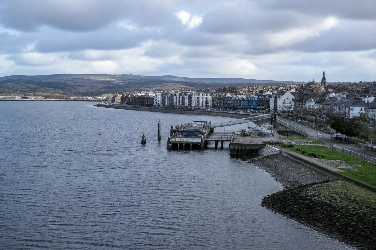 Representative cruise port destination view: Londonderry, Ireland; passenger waterfront and harbor water, not an exact landmark photograph.