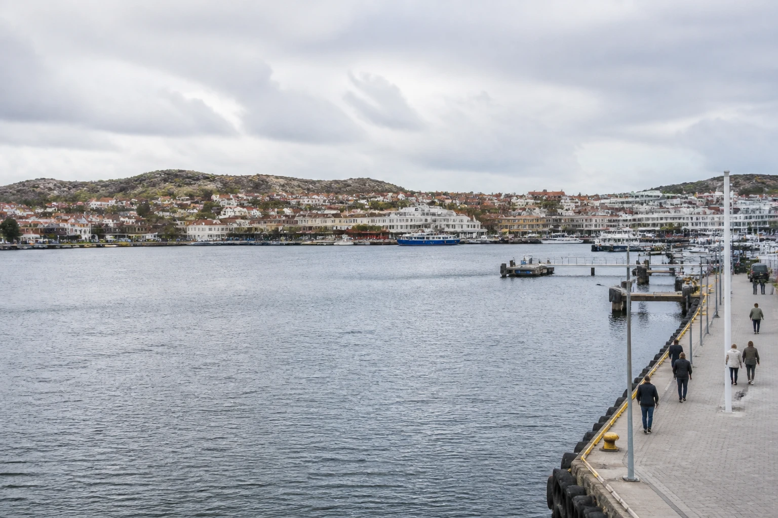 Representative cruise port destination view: Lysekil, Sweden; passenger waterfront and harbor water, not an exact landmark photograph.