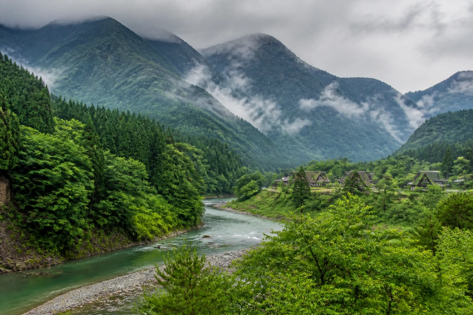 Representative mountain destination overview of Takayama and Shirakawa-go in Japan, showing mountain or canyon terrain, regional vegetation, and natural light rather than an exact landmark view.